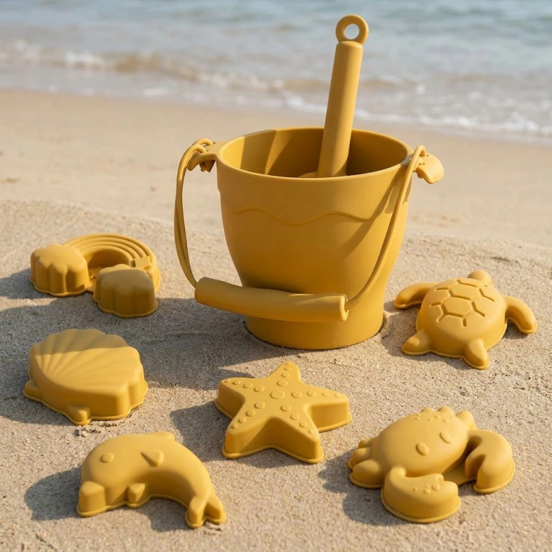 Set di 8 giocattoli da spiaggia in silicone con secchiello per bambini