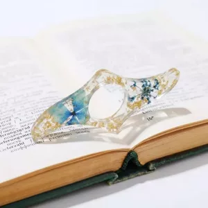 thumb book page holder, thumb ring page holder