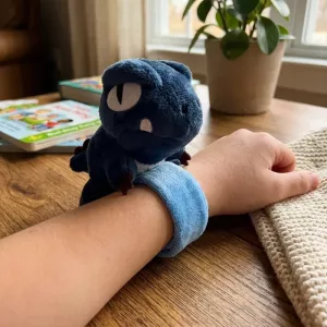 Grazioso braccialetto slap in peluche a forma di dinosauro per bambini