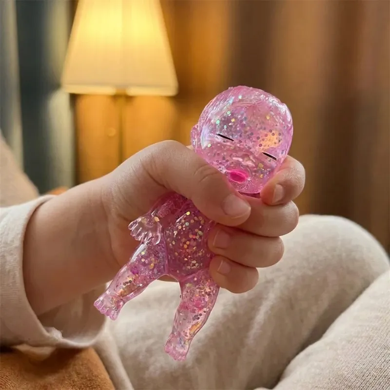 Giocattolo antistress sensoriale glitterato Squishmallow a forma di bebè da stringere per bambini